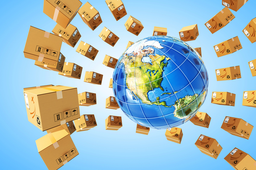 Worldwide purchases delivery and logistics concept, global parcels transportation business, packages around Earth globe on blue background